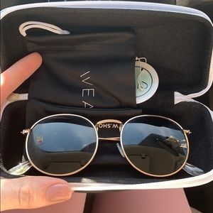 Gold rimmed black tint sunglasses